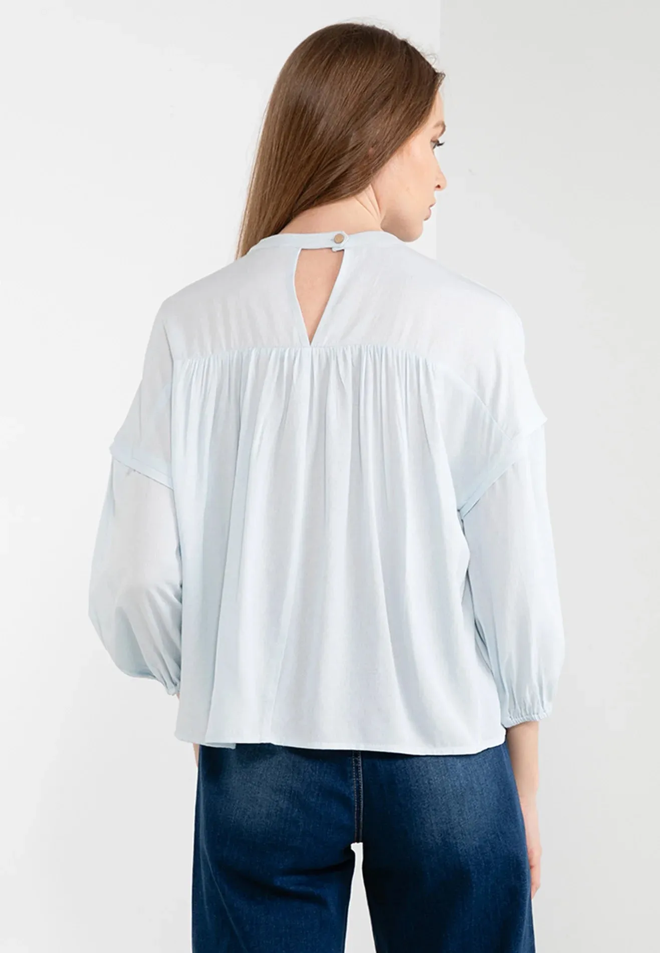 ELLE Apparel Loose Round Neck Layer Blouse